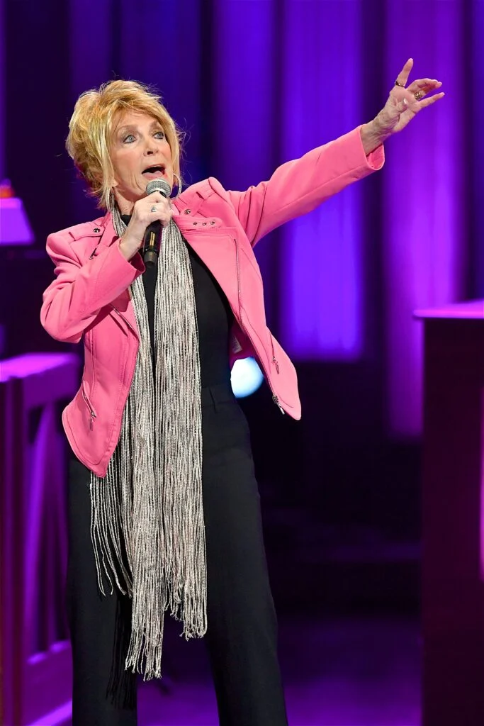 Jeannie Seely performing at the Grand Ole Opry during her historic career