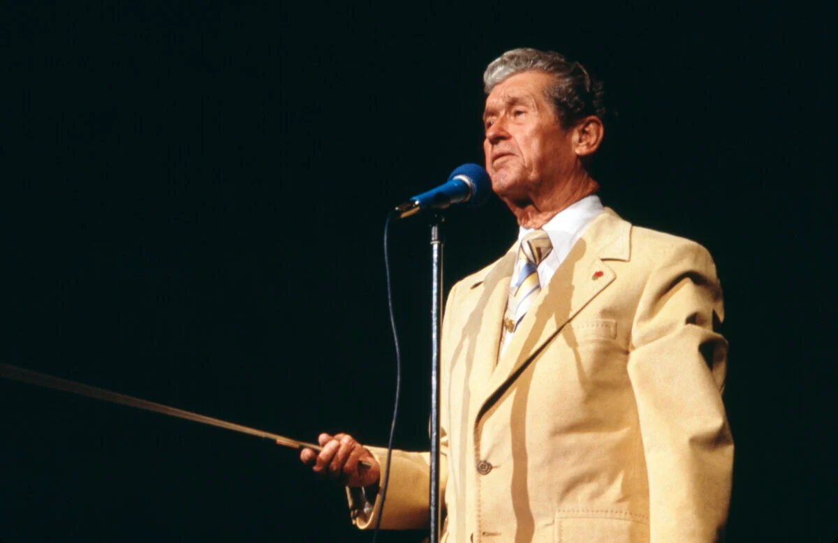 Roy Acuff performing, part of country music lineage leading to George Strait Honoree