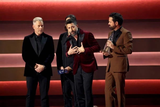Old Dominion accepting the CMA Award for Vocal Group of the Year in 2023. 
