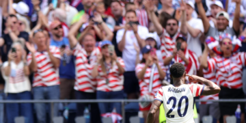 Watch 70,000 Fans Singing "Country Roads" Following Historic World Cup Win