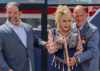 Dolly Parton celebrates the grand opening of her Tennessee travel stop