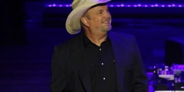 Here are a few options under 70 characters:

- Lesser-known details about Garth Brooks' signature hit
- The story behind Friends In Low Places, explained
- What you may not know about a classic Garth Brooks song