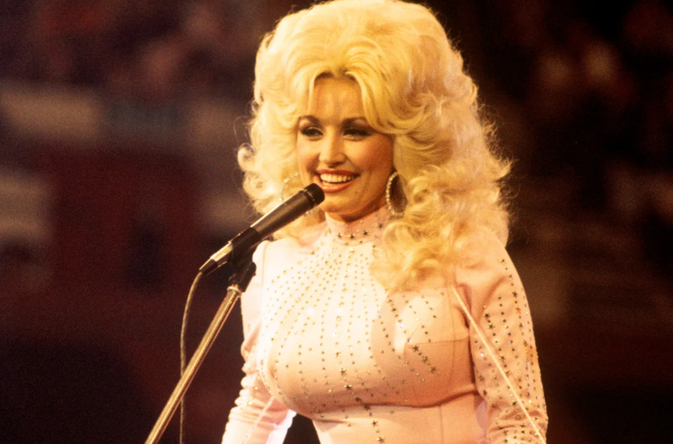 Dolly Parton smiling during her legendary country music career.